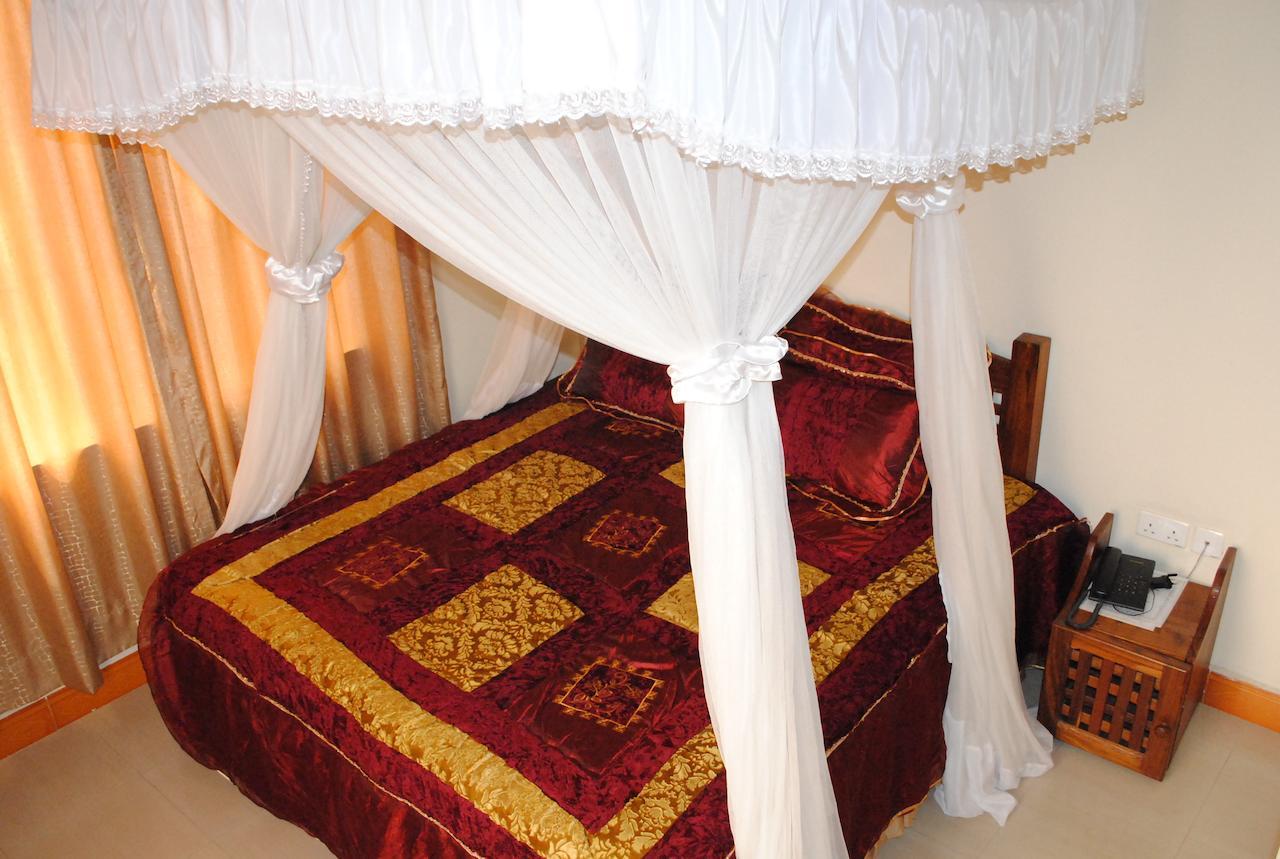Briston Hotel Arusha Quarto foto
