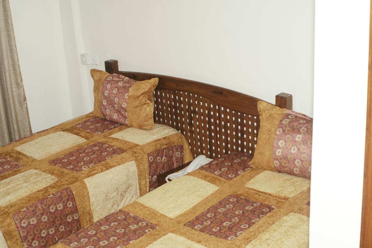 Briston Hotel Arusha Quarto foto